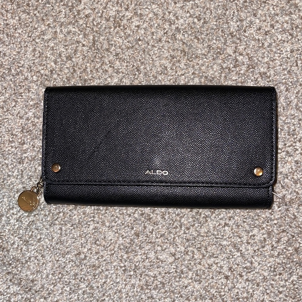 ALDO never used black and gold clutch